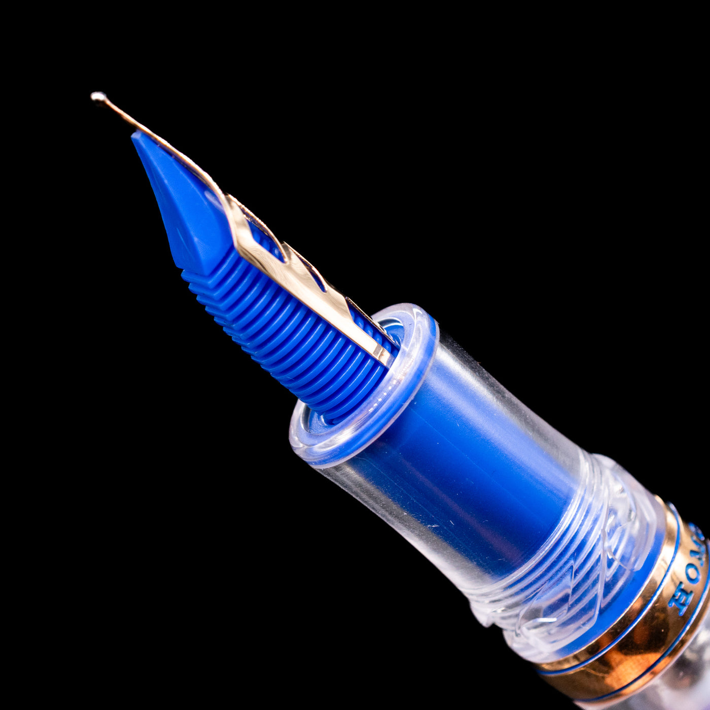Detailed macro image of the blue feed, highlighting craftsmanship of the Visconti Homo Sapiens Full Demo fountain pen.