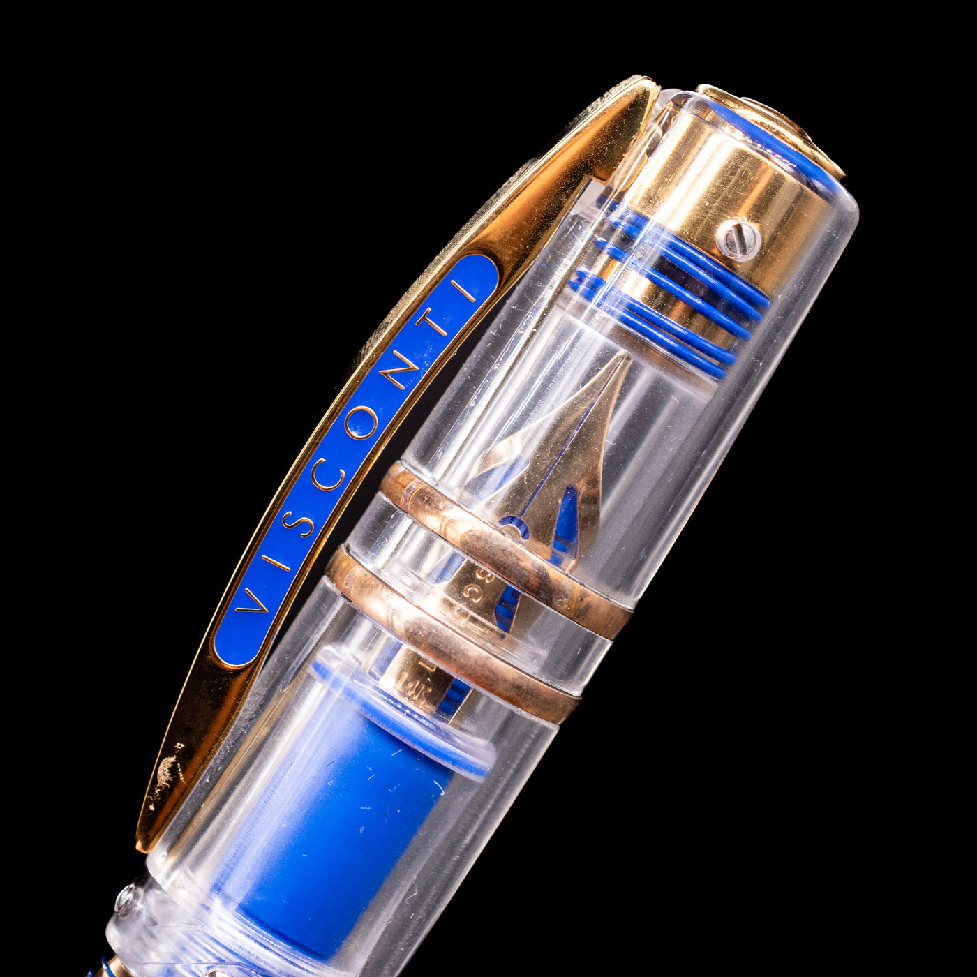 Close-up of the clip and cap engravings, emphasizing the metallic elements of the Visconti Homo Sapiens Full Demo fountain pen.
