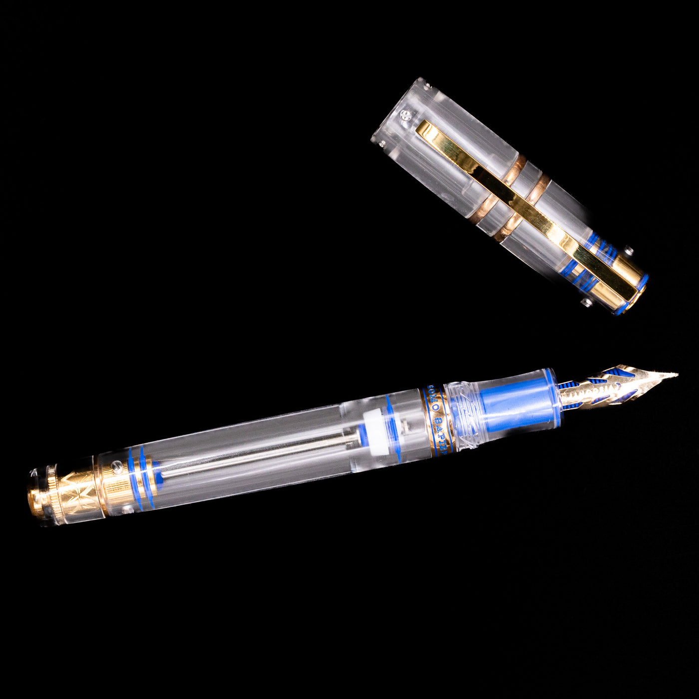 Overhead perspective of the capped pen, revealing clip, cap, and clear body of the Visconti Homo Sapiens Full Demo fountain pen.
