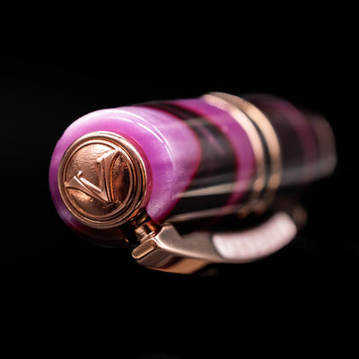 Zoomed-in view of the top of the cap with the finial on the Visconti Homo Sapiens Iris Garden Fountain Pen.