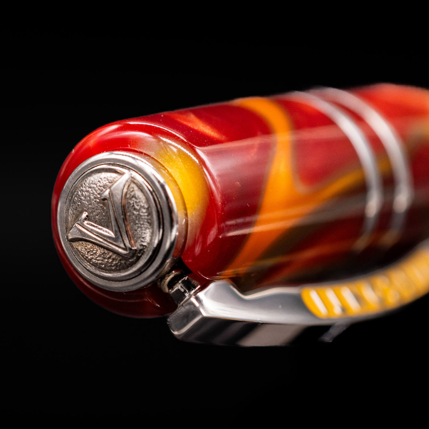 Zoomed-in view of the top of the cap with the finial on the Visconti Homo Sapiens Limited Edition Fountain Pen - Arizona Sunset.