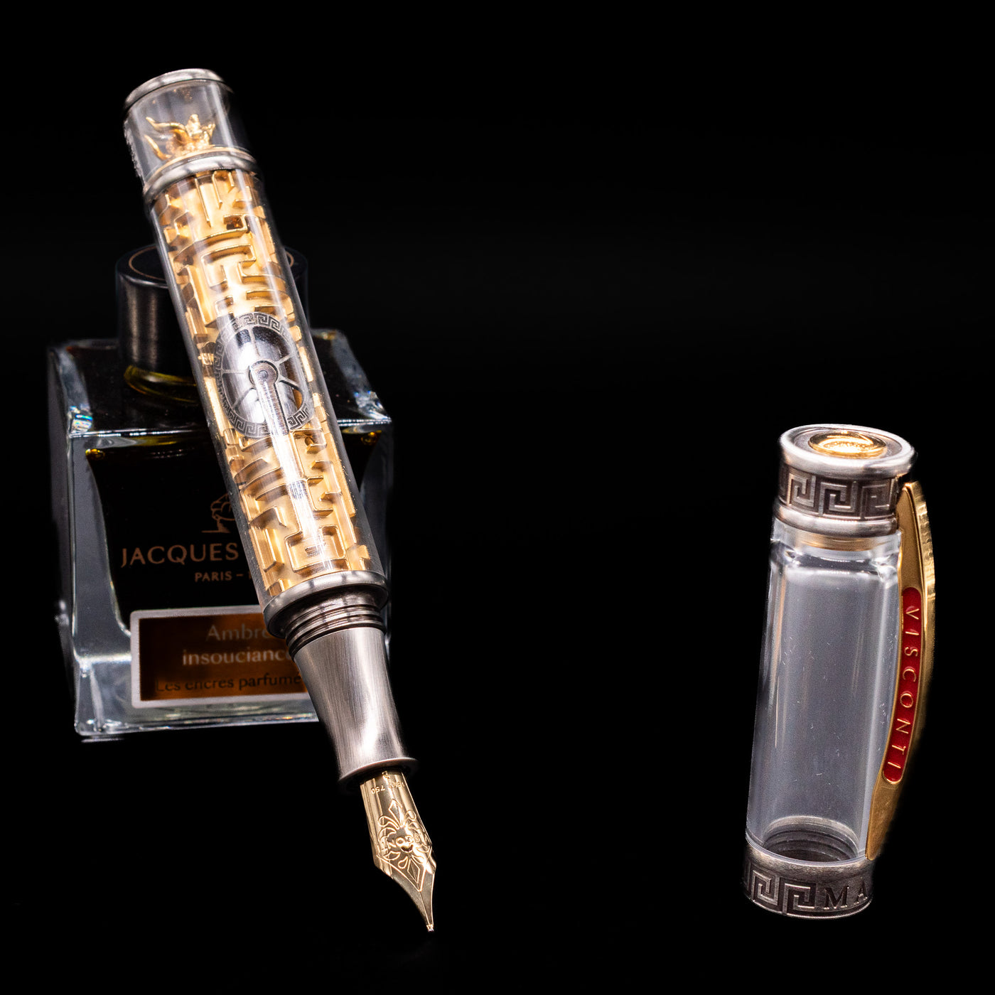 Visconti Limited Edition Fountain Pen - Maze leaning on an ink bottle uncapped showcasing the detailing on the nib.