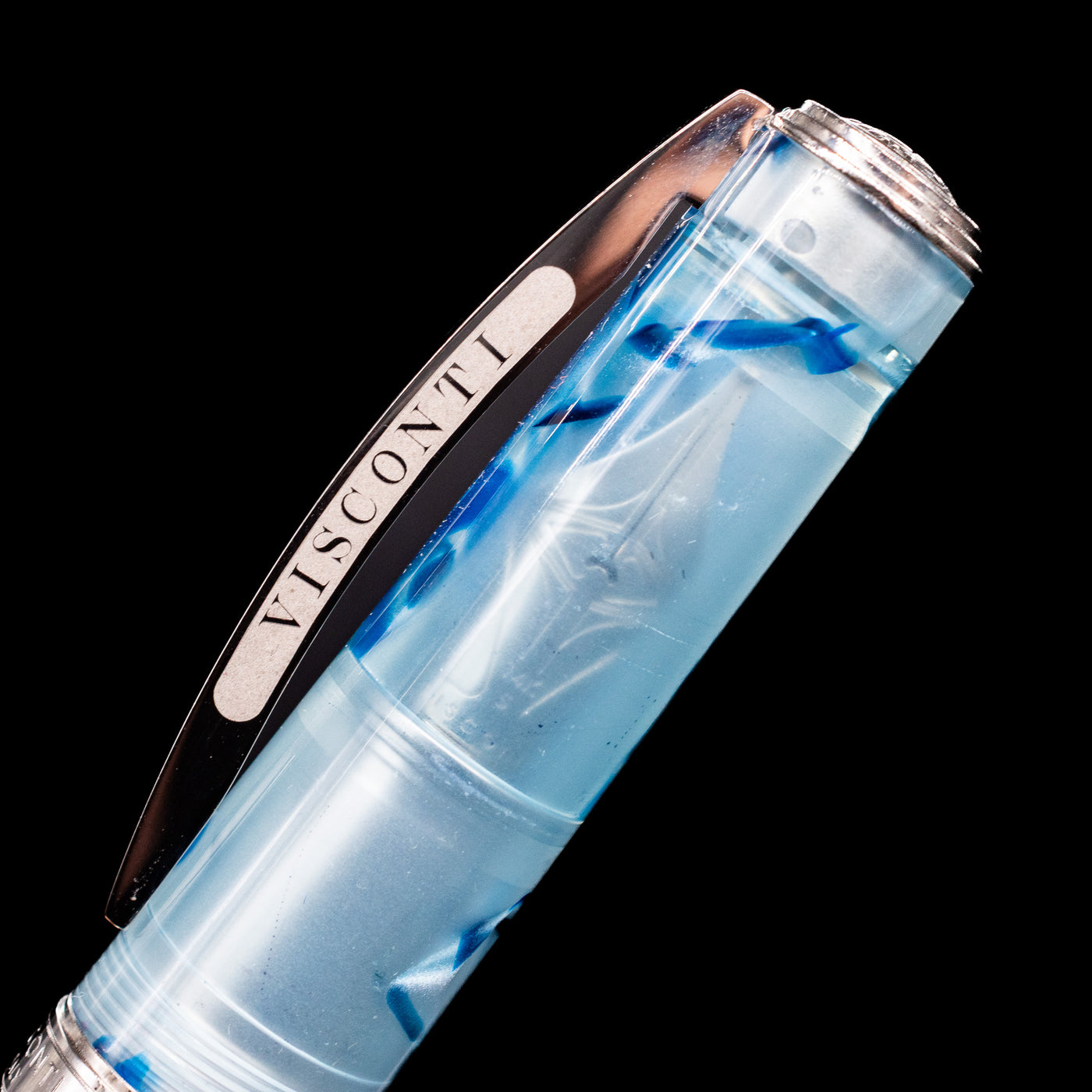 Close-up view of the cap on the Visconti Manhattan Fountain Pen - Ice Blue and the VIsconti bridge-like clip.