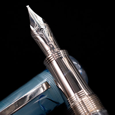 A macro shot of the nib with its intricate detailing and logo engraving for the Visconti Manhattan Fountain Pen - Ice Blue.