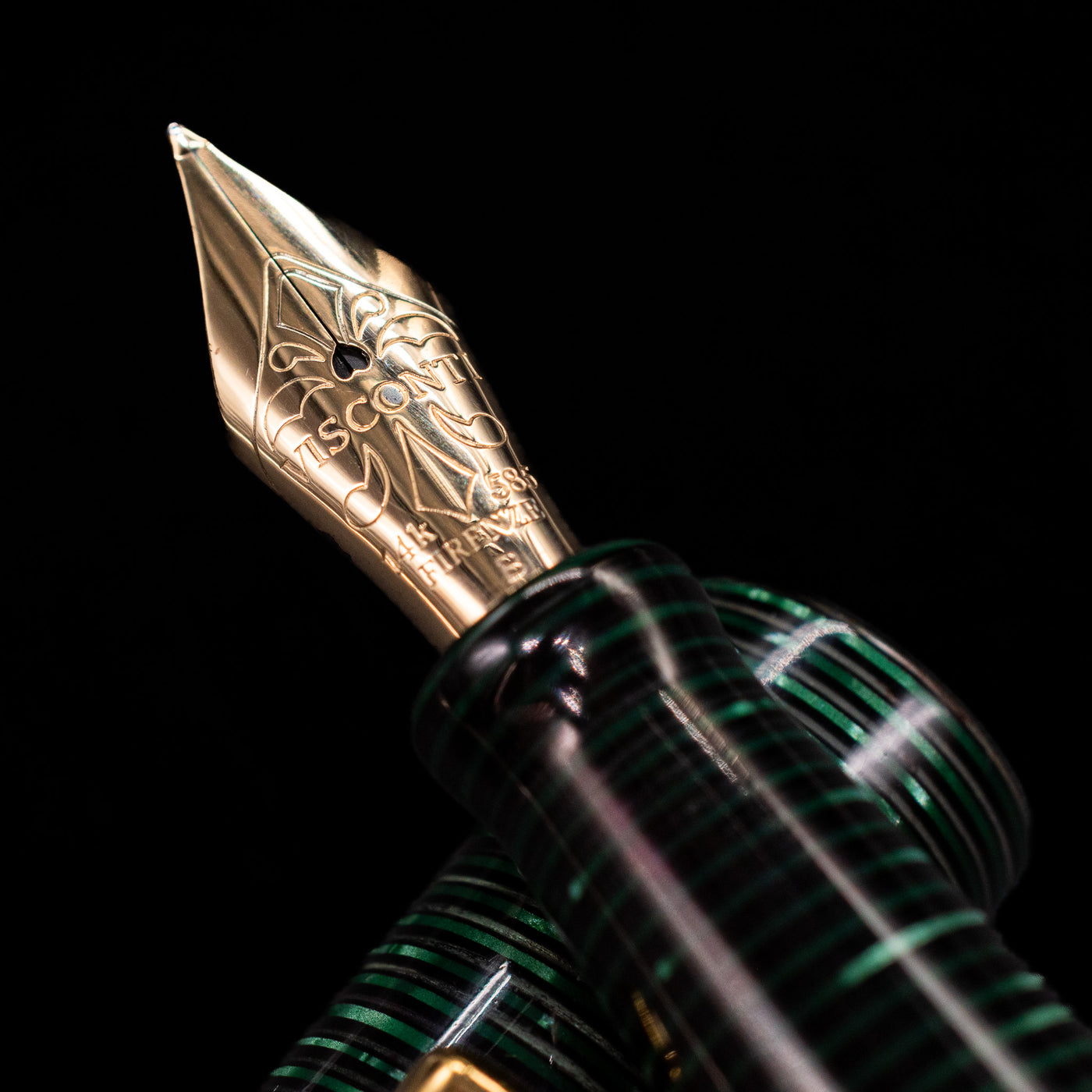  A macro shot of the nib with its intricate detailing and logo engraving for the Visconti Manhattan Green Celluloid Fountain Pen - Preowned.