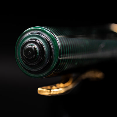 Zoomed-in view of the top of the cap with the finial on the Visconti Manhattan Green Celluloid Fountain Pen - Preowned.