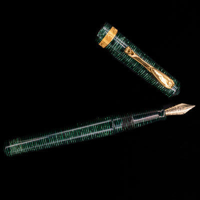 An overhead view of the Visconti Manhattan Green Celluloid Fountain Pen - Preowned uncapped.