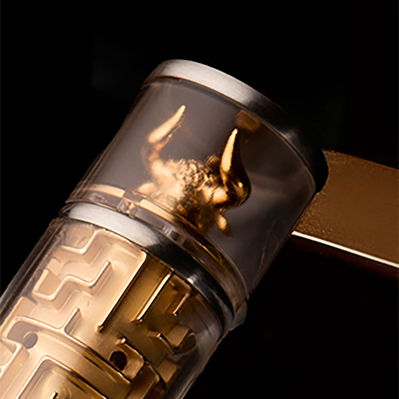 Minotaur sculpture detail at the barrel end of Visconti Maze fountain pen.