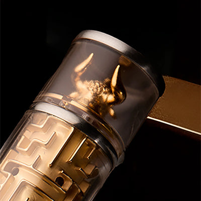 Minotaur sculpture detail at the barrel end of Visconti Maze fountain pen.