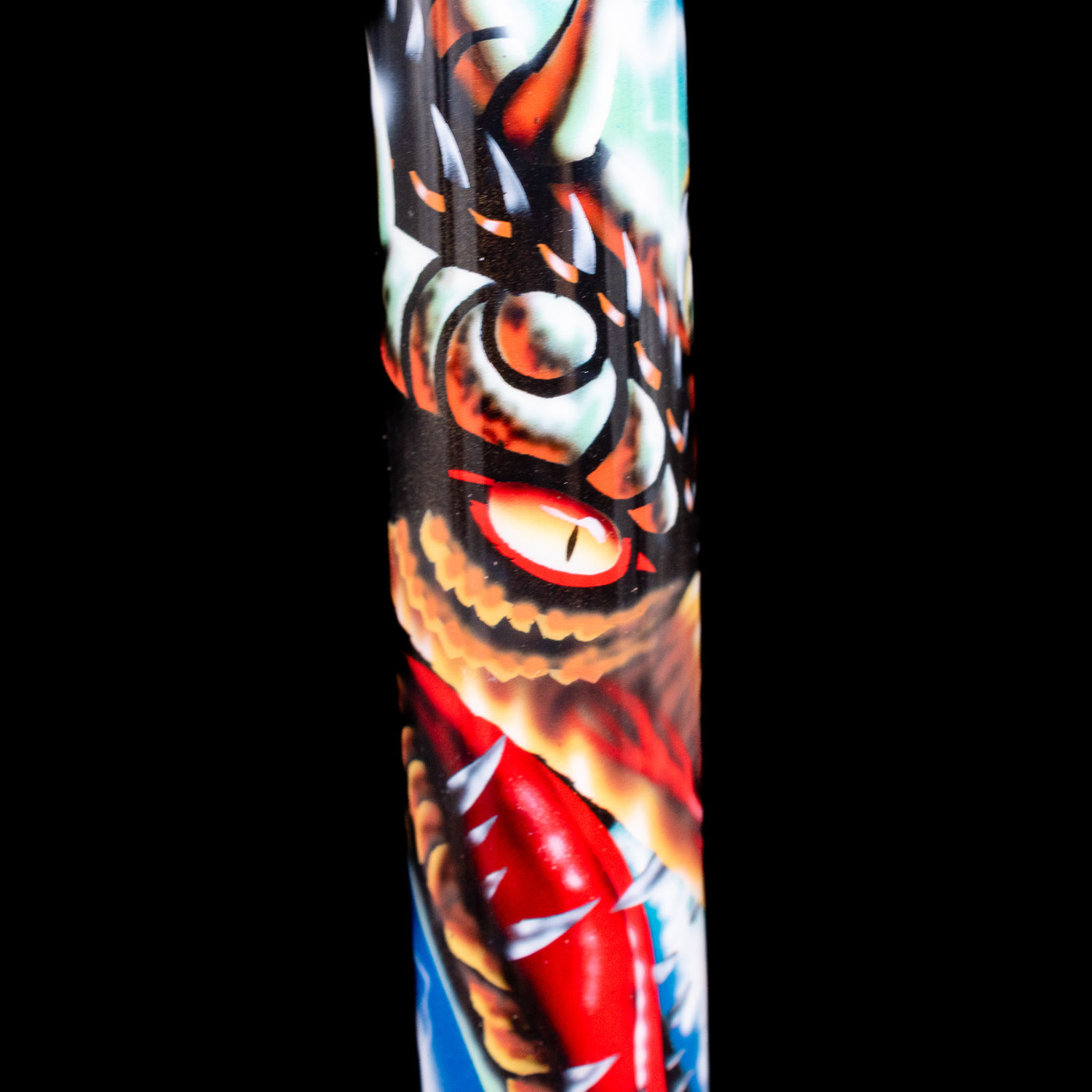 Detail close-up shot of the eye of the dragon airbrushed on the Visconti Mazzi Dragon Limited Edition Fountain Pen.