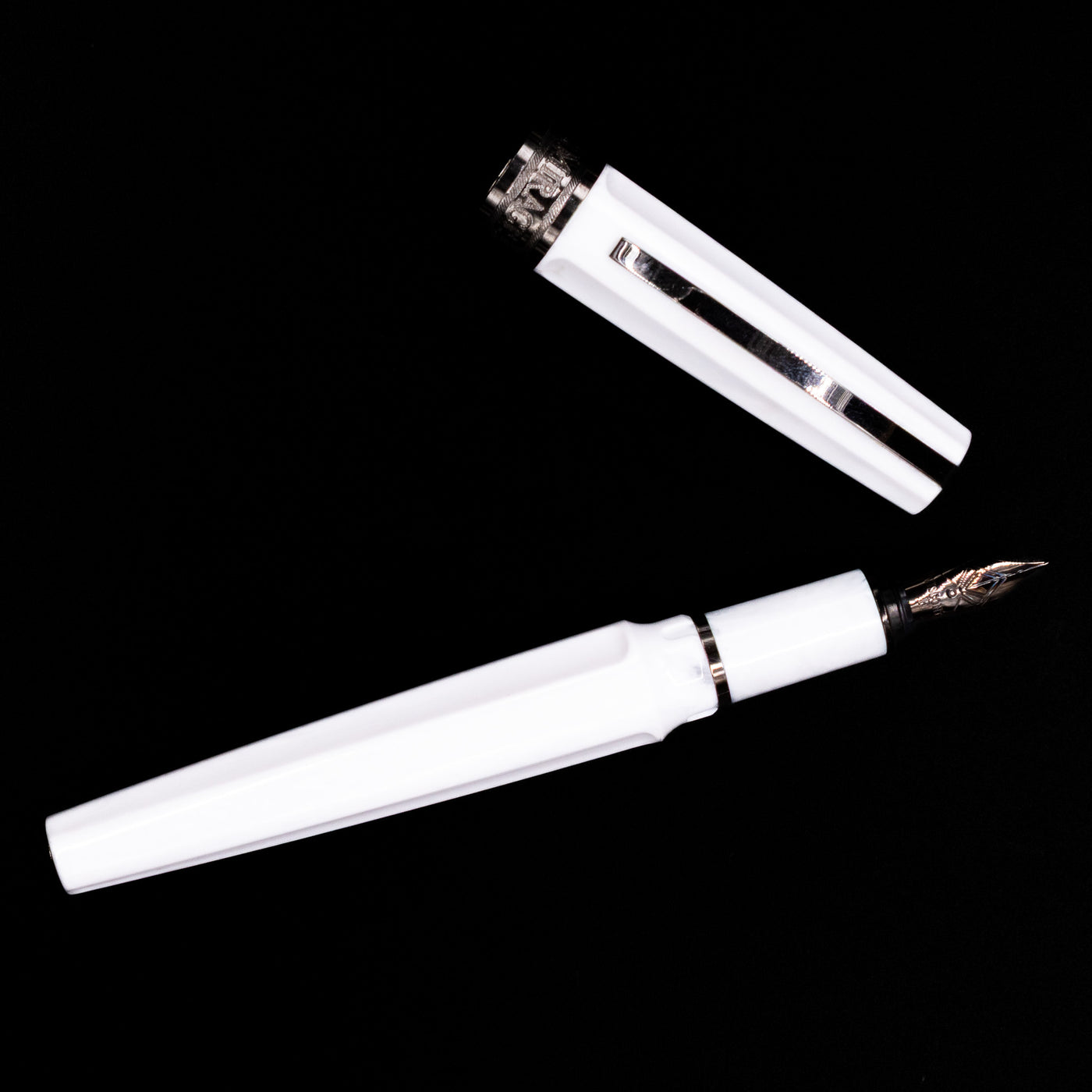 An overhead view of the Visconti Mirage Athena Fountain Pen - Preowned uncapped.