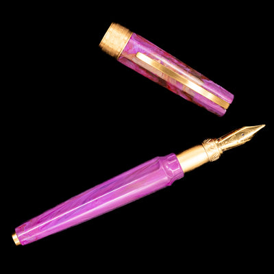An overhead view of the Visconti Mirage Mythos Fountain Pen - Aphrodite uncapped. 