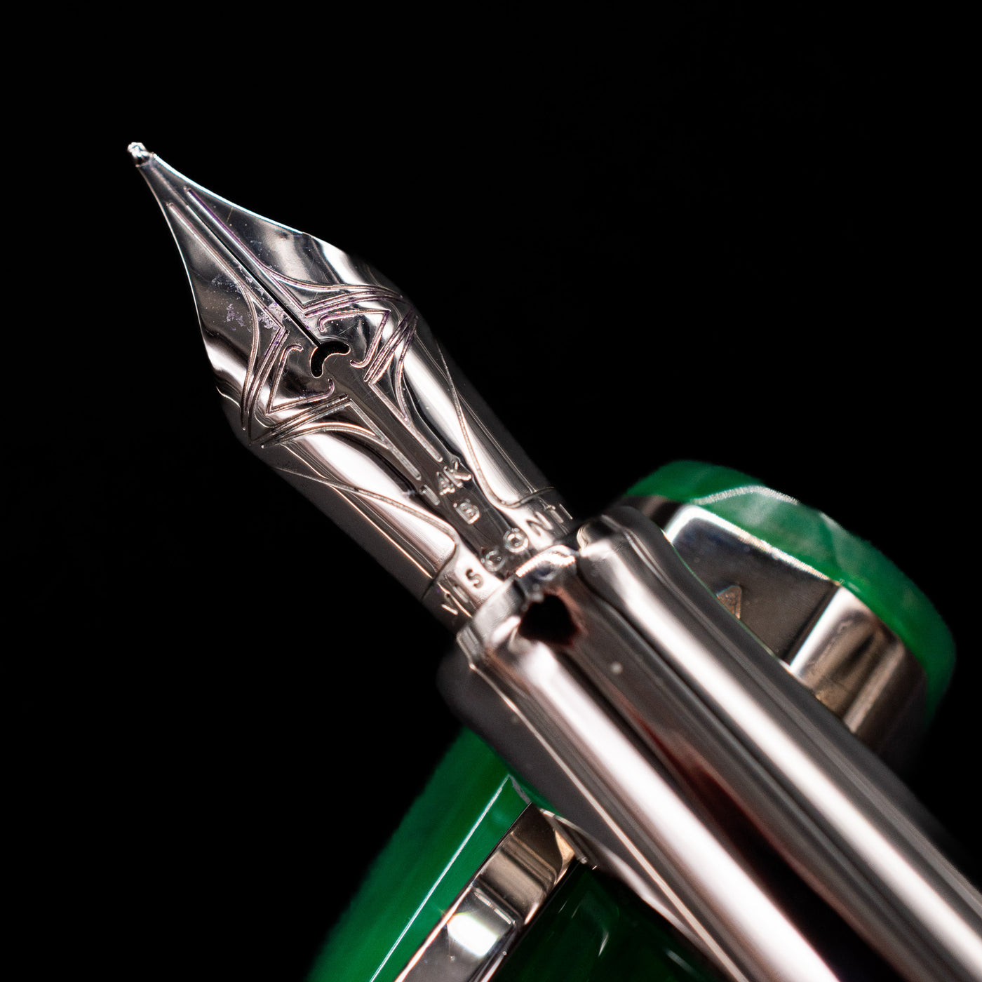 A macro shot of the nib with its intricate detailing and logo engraving for the Visconti Opera Carousel Fountain Pen - Green Mint.