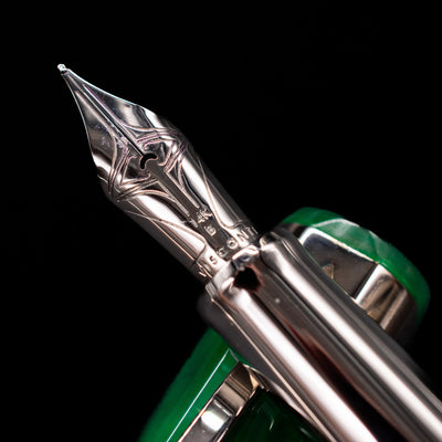A macro shot of the nib with its intricate detailing and logo engraving for the Visconti Opera Carousel Fountain Pen - Green Mint.