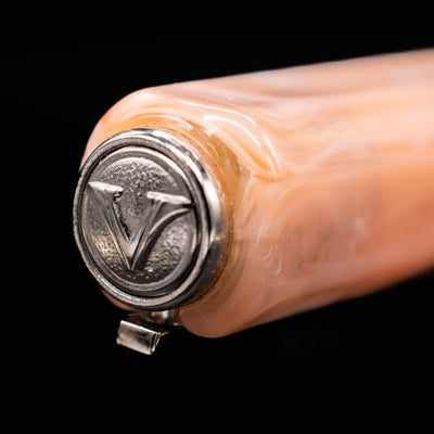 Zoomed-in view of the top of the cap with the finial on the Visconti Opera Carousel Fountain Pen - Pink Blush.