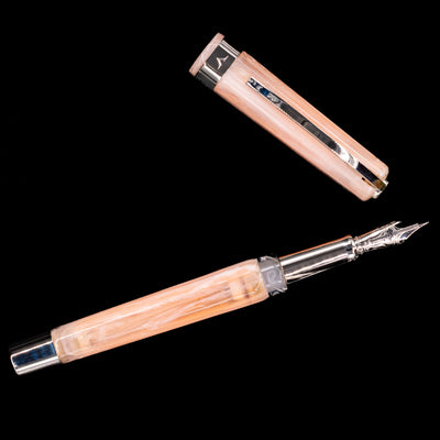 An overhead view of the Visconti Opera Carousel Fountain Pen - Pink Blush uncapped.