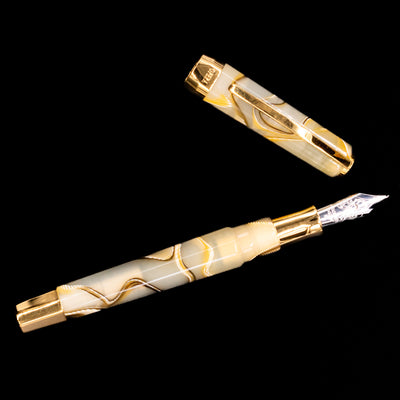An overhead view of the Visconti Opera Club Honey Almond Resin Fountain Pen - Preowned uncapped.