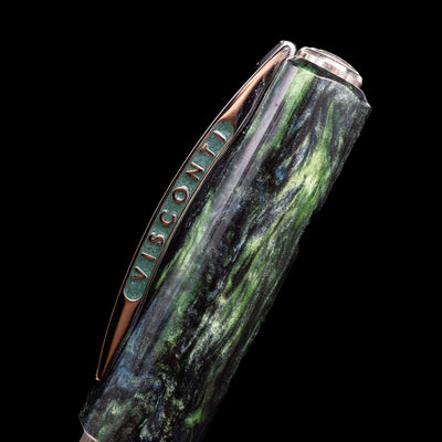Close-up view of the cap and its bridge-like clip with the Visconti logo on the Visconti Opera Master Fountain Pen - Stargazer.