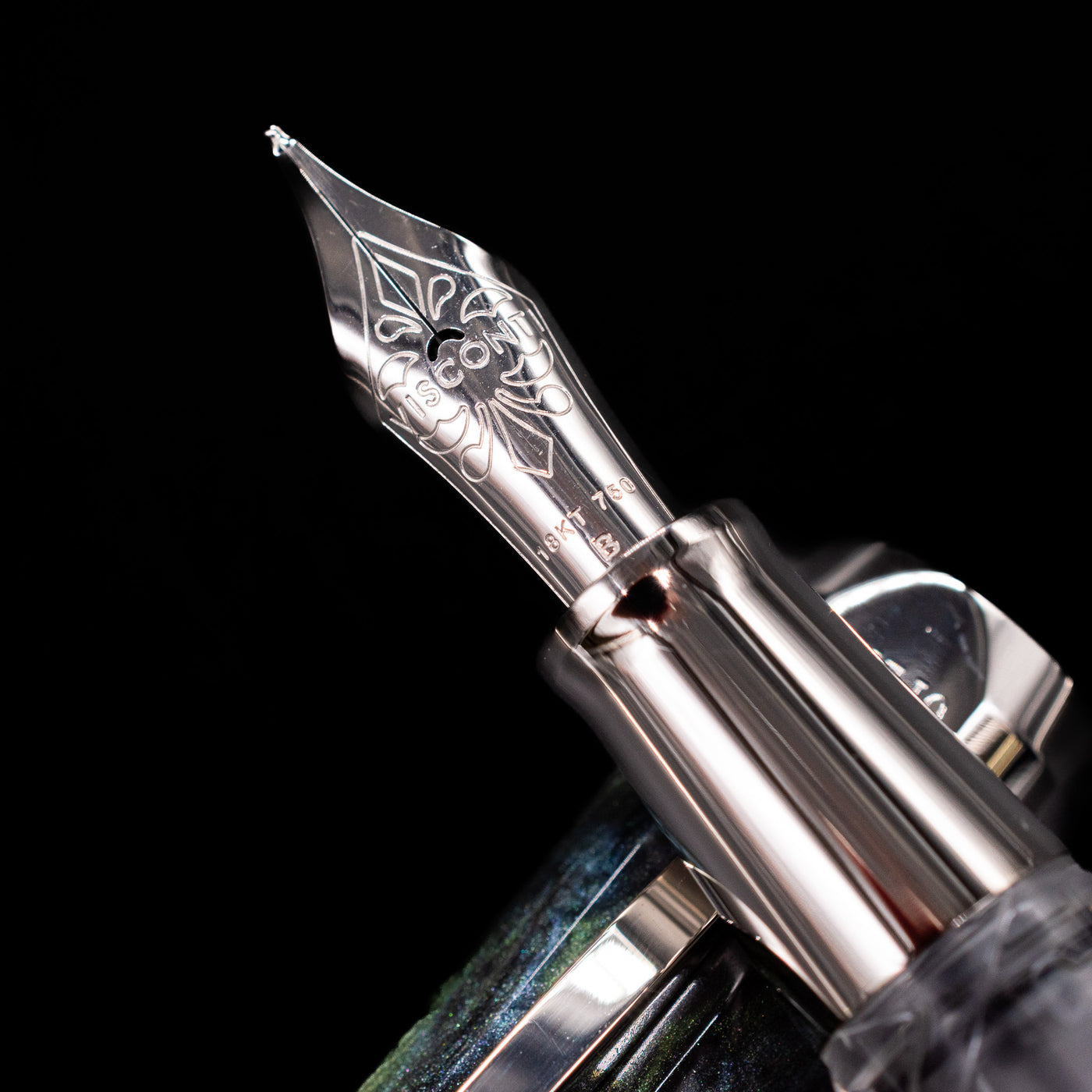  A macro shot of the 18k nib with its intricate detailing and Visconti logo engraving for the Visconti Opera Master Fountain Pen - Stargazer.
