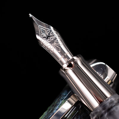  A macro shot of the 18k nib with its intricate detailing and Visconti logo engraving for the Visconti Opera Master Fountain Pen - Stargazer.