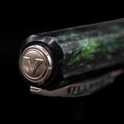 Zoomed-in view of the top of the cap with the Visconti finial on the Visconti Opera Master Fountain Pen - Stargazer.