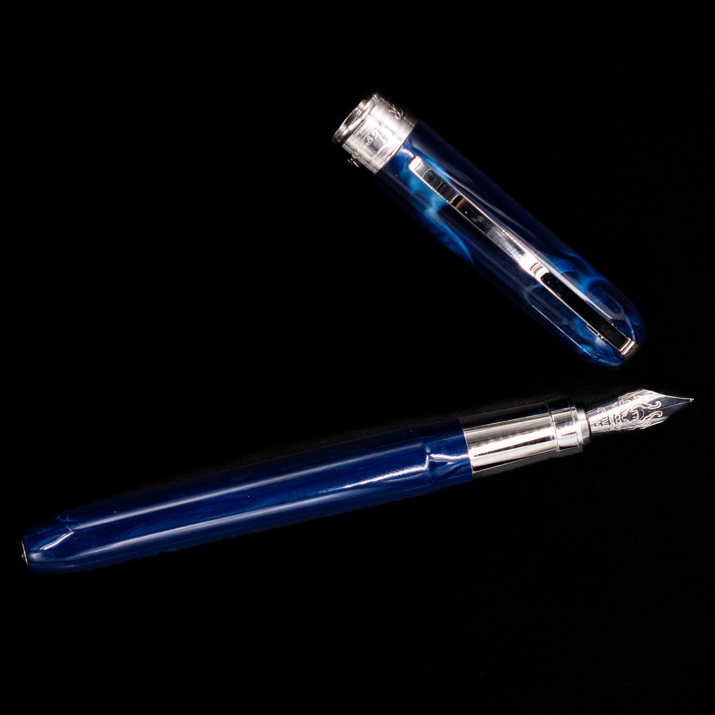 An overhead view of the Visconti Rembrandt Blue Fountain Pen - Preowned uncapped.