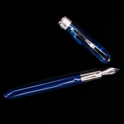 An overhead view of the Visconti Rembrandt Blue Fountain Pen - Preowned uncapped.