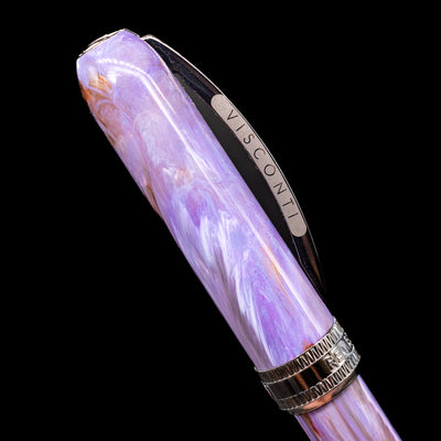 Close-up view of the cap and its bridge-like clip with the Visconti logo on the Visconti Rembrandt S Fountain Pen - Lavender.