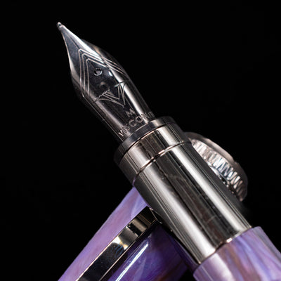 A macro shot of the 18k nib with its intricate detailing and Visconti logo engraving for the Visconti Rembrandt S Fountain Pen - Lavender.