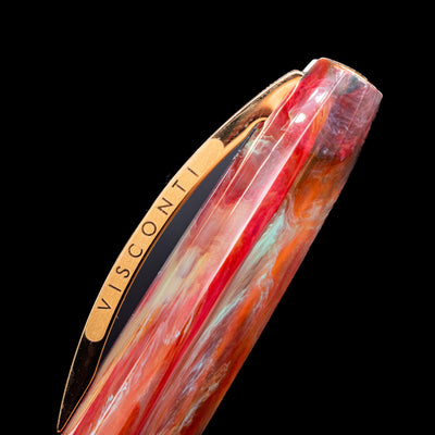 Close-up view of the cap and its bridge-like clip with the Visconti logo on the Visconti Van Gogh Fountain Pen - Flowering Plum Orchard.
