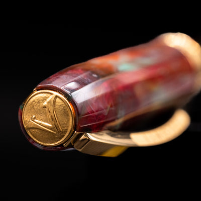 Zoomed-in view of the top of the cap with the Visconti finial on the Visconti Van Gogh Fountain Pen - Flowering Plum Orchard.