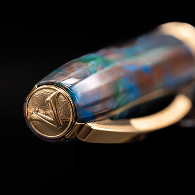 Zoomed-in view of the top of the cap with the Visconti finial on the Visconti Van Gogh Fountain Pen - Oiran.