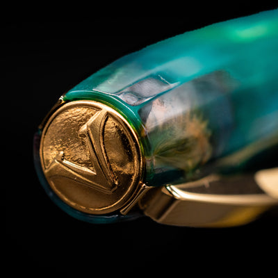 Zoomed-in view of the top of the cap with the Visconti finial on the Visconti Van Gogh Fountain Pen - The Novel Reader.
