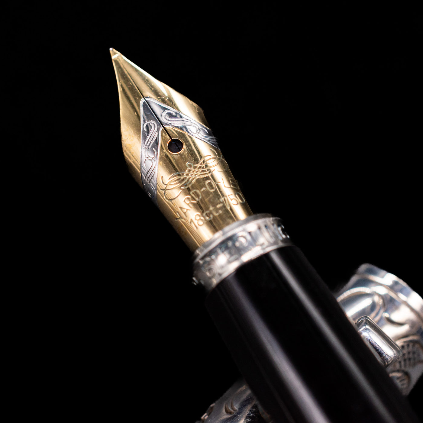 A macro shot of the nib with its intricate detailing and logo engraving for the Yard O Led Imperial Dragon Fountain Pen - Preowned.