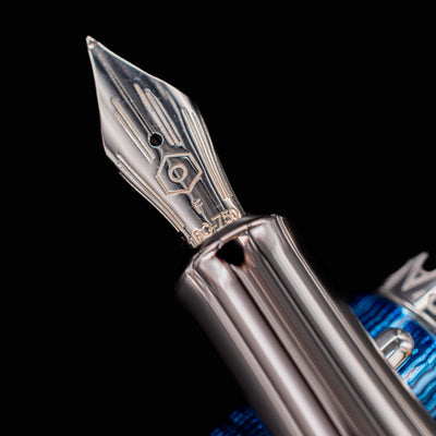 Closeup of 18k gold rhodium nib on Grand Bleu fountain pen