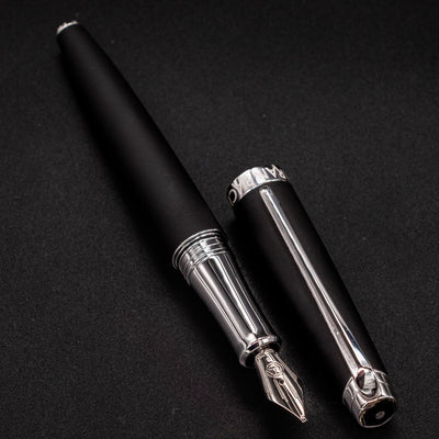 Léman V2 Matte Black pen barrel and cap resting side by side
