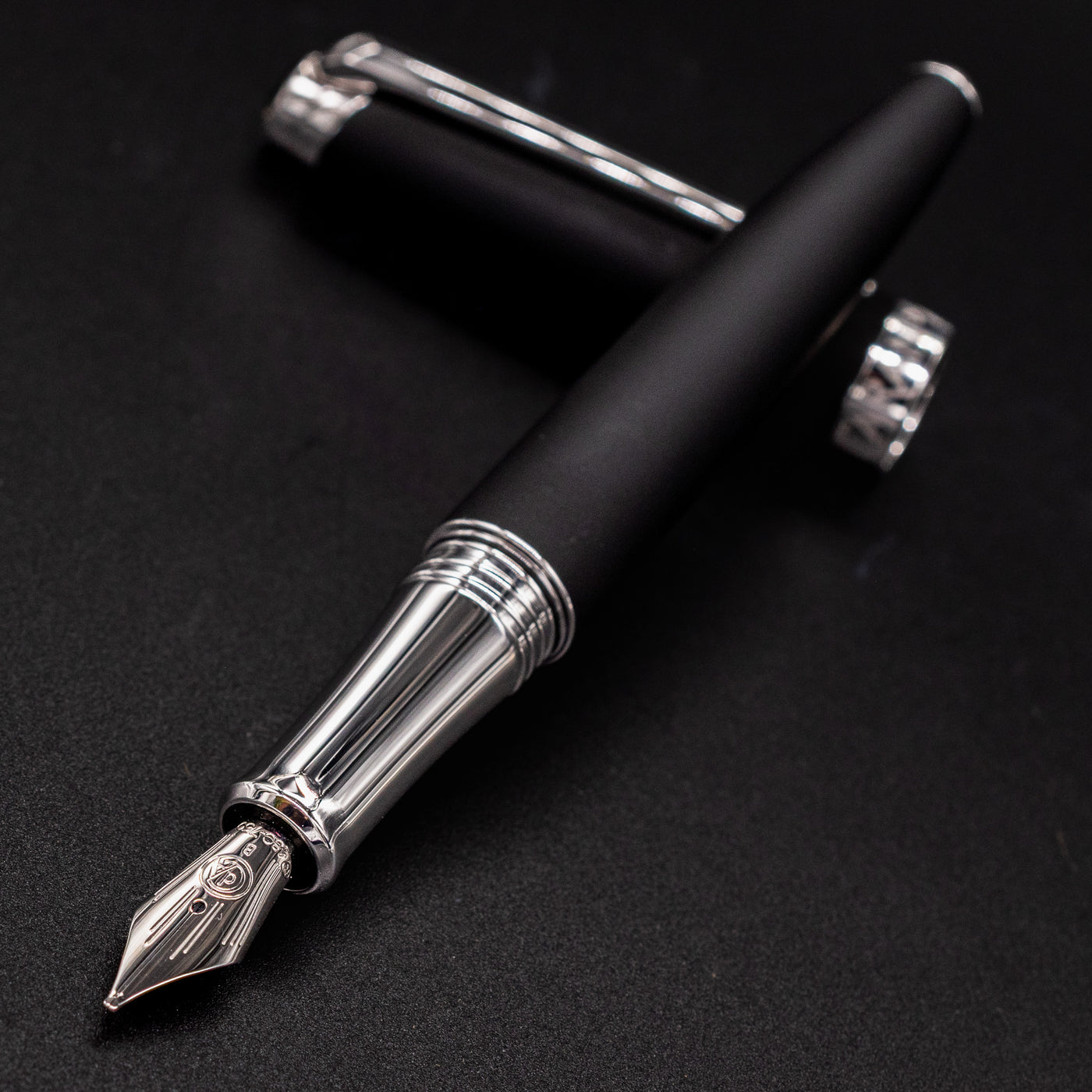 Matte Black Léman V2 fountain pen with nib angled toward the camera