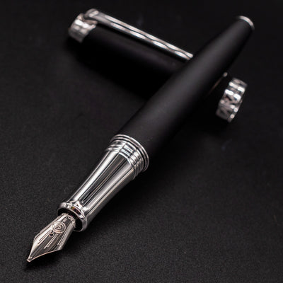 Matte Black Léman V2 fountain pen with nib angled toward the camera