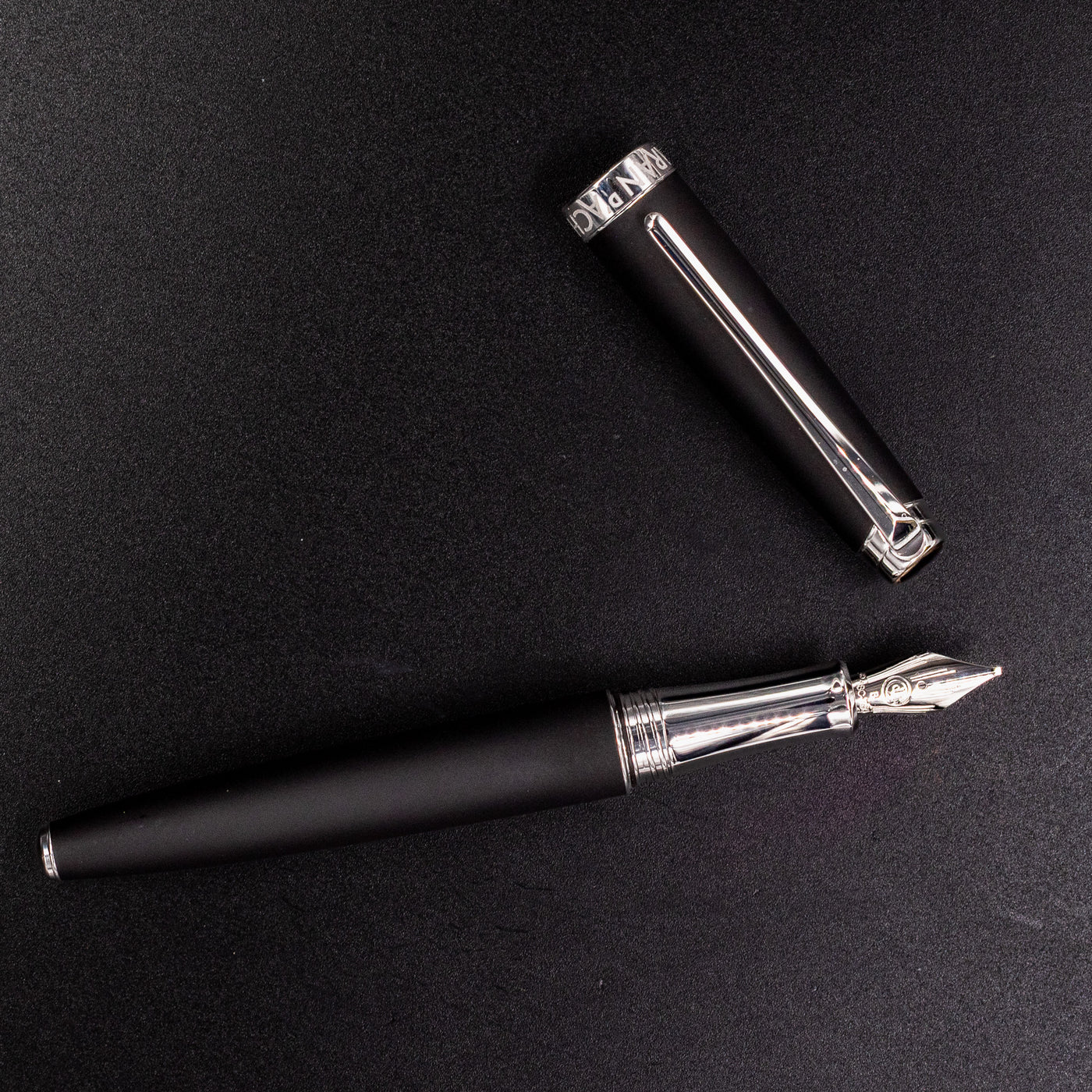 Top-down shot of uncapped Léman V2 Matte Black fountain pen