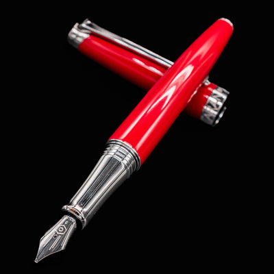 Scarlet Léman V2 fountain pen uncapped with nib angled at the viewer