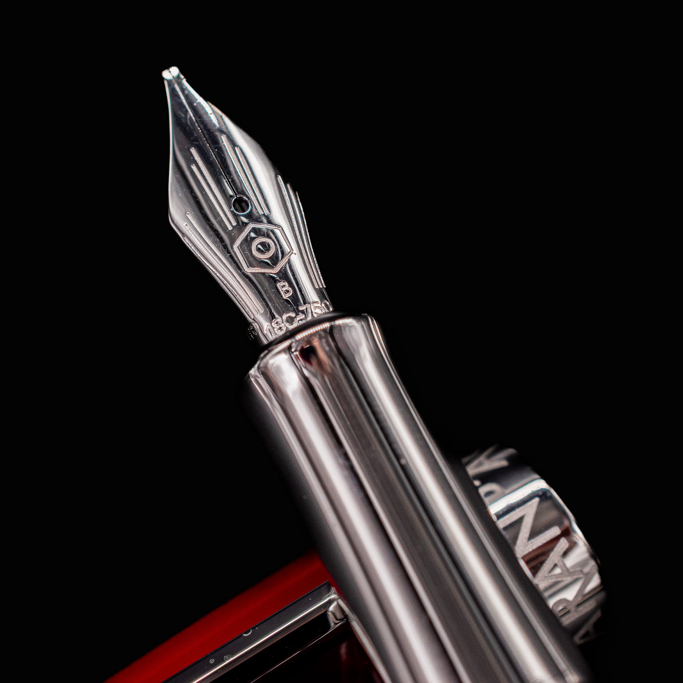 Closeup of the 18k rhodium nib on Caran d’Ache Léman V2 Scarlet fountain pen