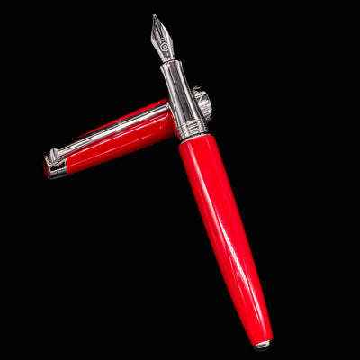 Overhead image of uncapped Léman V2 Scarlet with body resting on cap