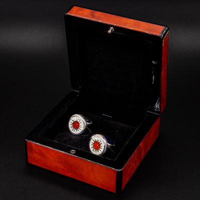 David Oscarson Celestial Cufflinks in presentation box, showing red sun design