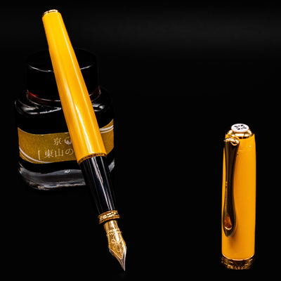 Full view of the Diplomat Excellence A2 Yellow & Gold fountain pen, showcasing lacquer finish and gold trim