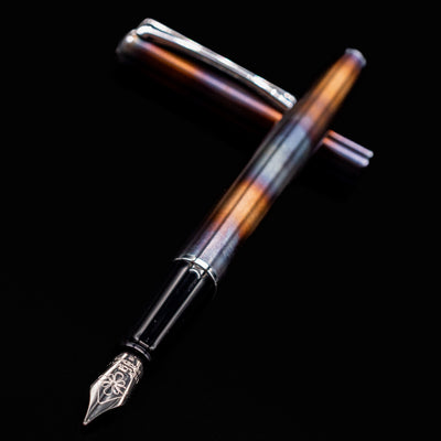 Diplomat Traveller Flame fountain pen uncapped, showcasing full barrel and nib
