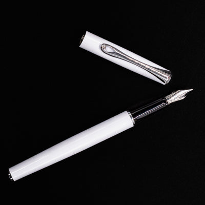 Top-down view of open Diplomat Traveller Fountain Pen in White with Chrome Trim