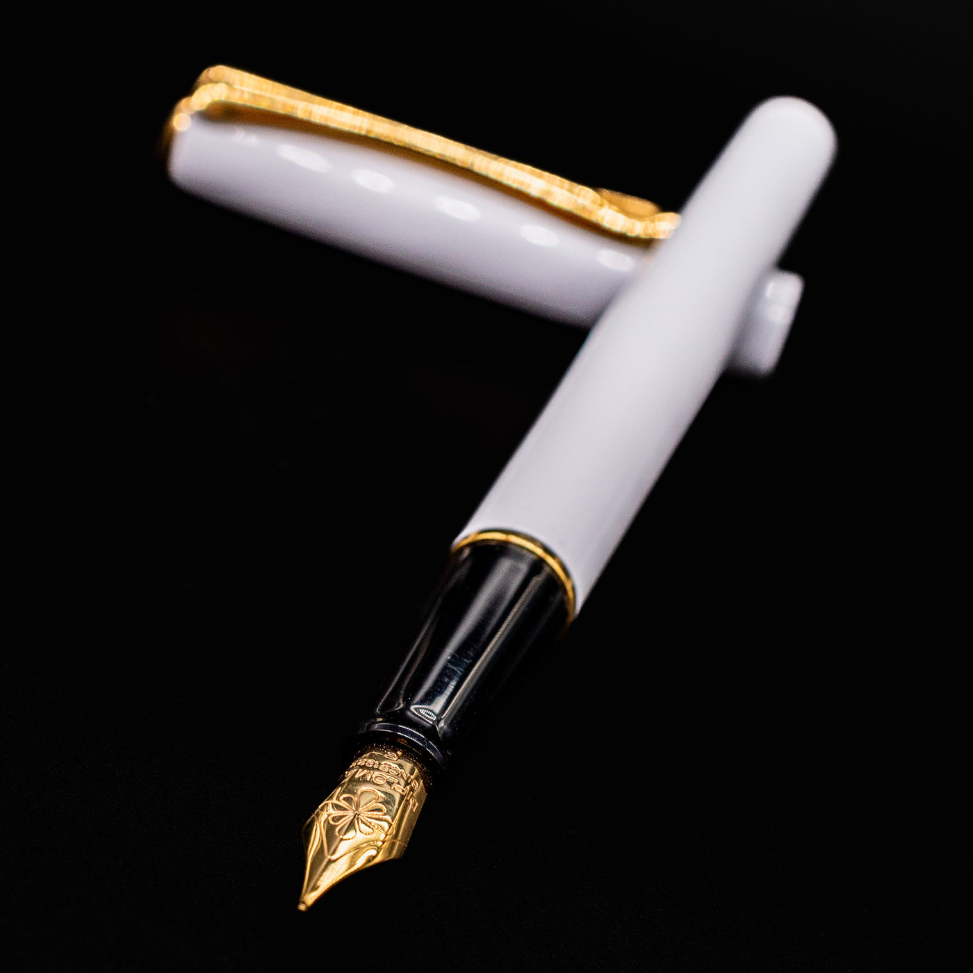Close-up of the open Diplomat Traveller Fountain Pen in White & Gold finish