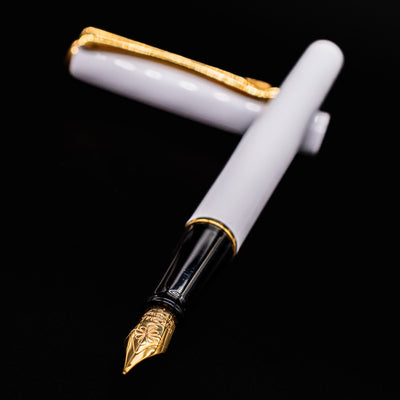 Close-up of the open Diplomat Traveller Fountain Pen in White & Gold finish