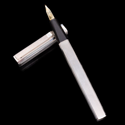 Dunhill Gemline Classic Dress Fountain Pen with cap placed underneath and pen angled across