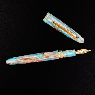 Full overhead view of Esterbrook Estie Avalanche fountain pen uncapped - DiamondCast artisan resin pen